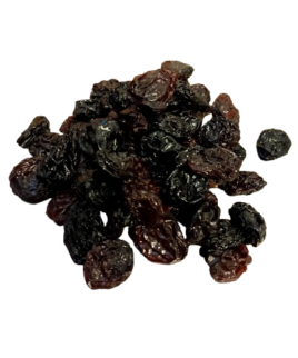 a pile of raisins on a white background